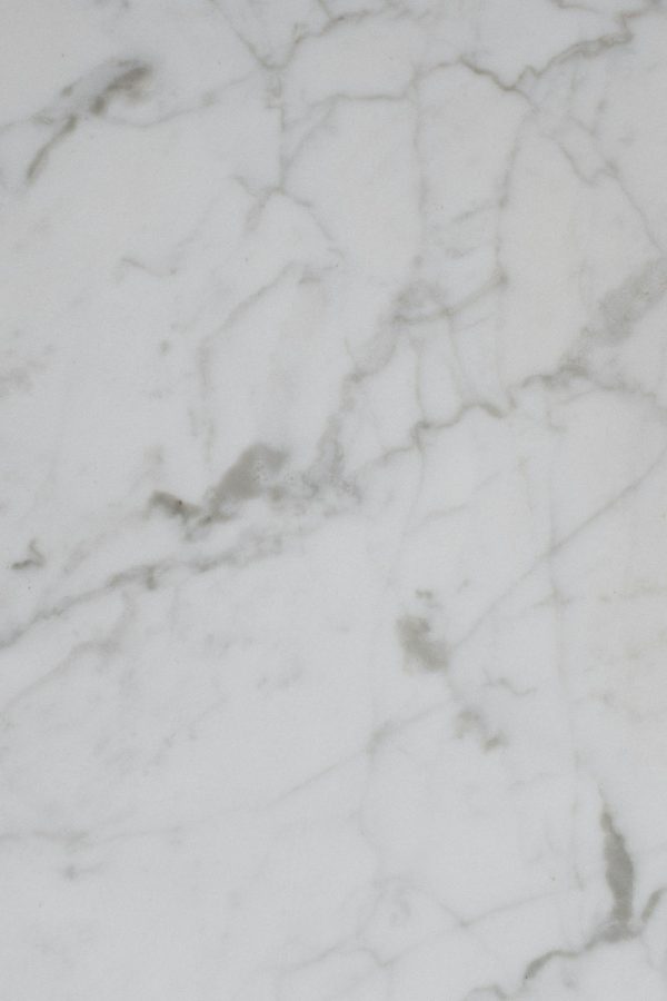 High-resolution white marble texture perfect for backgrounds and design projects.